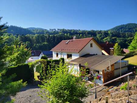 Gartenansicht - Einfamilienhaus in 64760 Oberzent mit 107m² kaufen