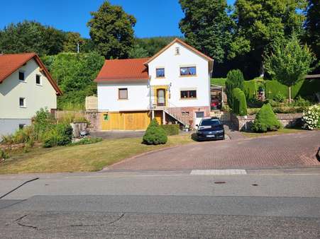 Titelbild - Einfamilienhaus in 64760 Oberzent mit 107m² kaufen