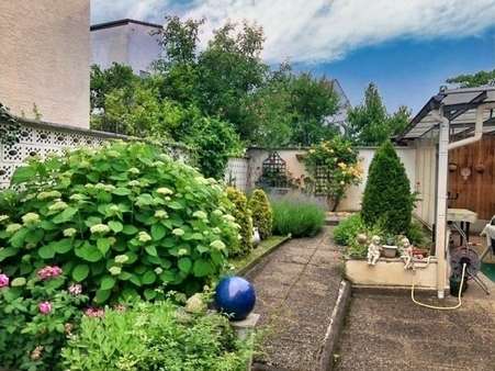 Garten mit Weg - Einfamilienhaus in 64569 Nauheim mit 79m² kaufen