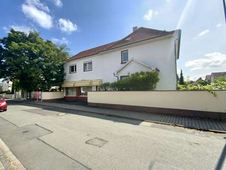 Außenansicht mit Verkaufsraum Außenansicht mit Verkaufsraum - Mehrfamilienhaus in 64546 Mörfelden-Walldorf mit 164m² kaufen