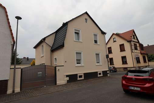 Außenansicht Außenansicht - Einfamilienhaus in 65428 Rüsselsheim mit 129m² kaufen