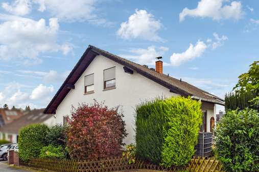 Straßenansicht - Einfamilienhaus in 64354 Reinheim mit 135m² kaufen