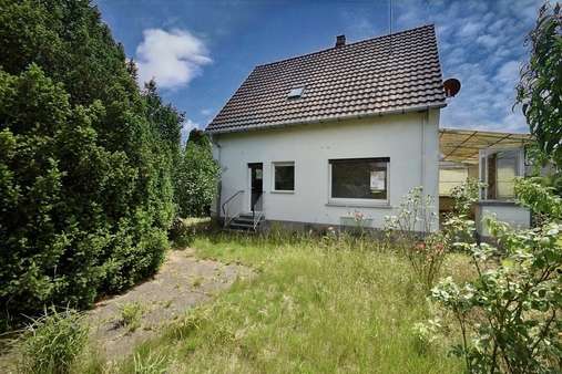 Rückansicht - Einfamilienhaus in 64832 Babenhausen mit 87m² kaufen