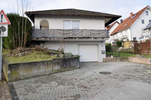 Westansicht mit Hof - Bungalow in 64354 Reinheim mit 131m² kaufen