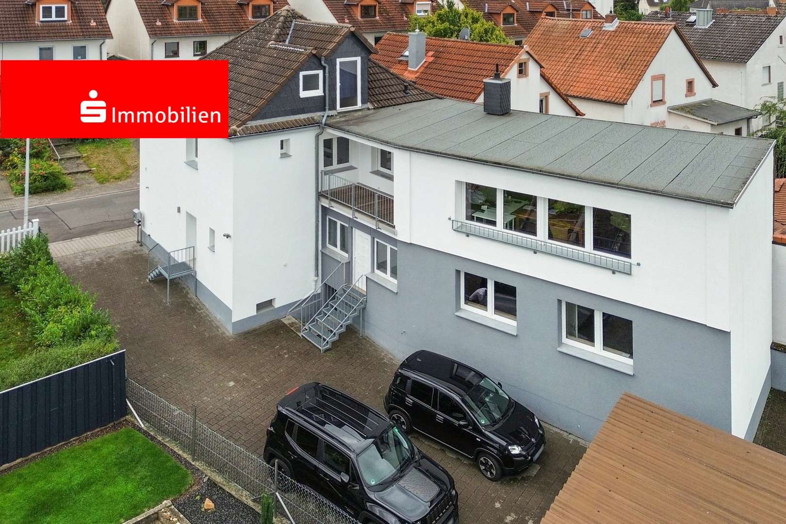 Seitenansicht Seitenansicht - Zweifamilienhaus in 63322 Rödermark mit 206m² kaufen