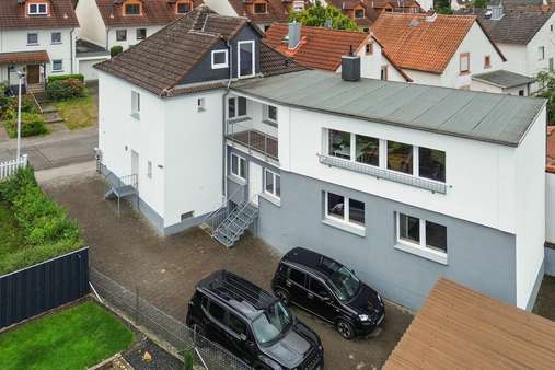 Seitenansicht Seitenansicht - Zweifamilienhaus in 63322 Rödermark mit 206m² kaufen