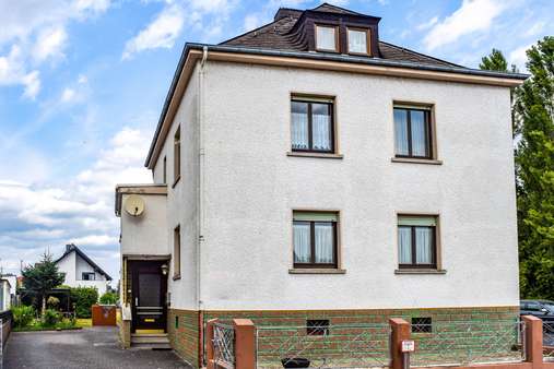 Vorderansicht - Zweifamilienhaus in 65604 Elz mit 160m² kaufen