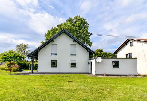 Rückansicht Rückansicht - Einfamilienhaus in 56459 Bellingen mit 140m² kaufen