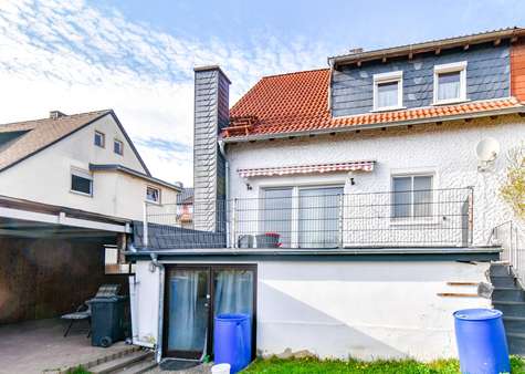 Gartenansicht - Doppelhaushälfte in 35796 Weinbach mit 122m² kaufen