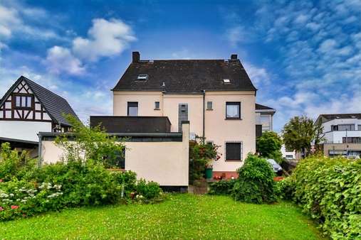 Rückansicht - Mehrfamilienhaus in 65604 Elz mit 157m² kaufen