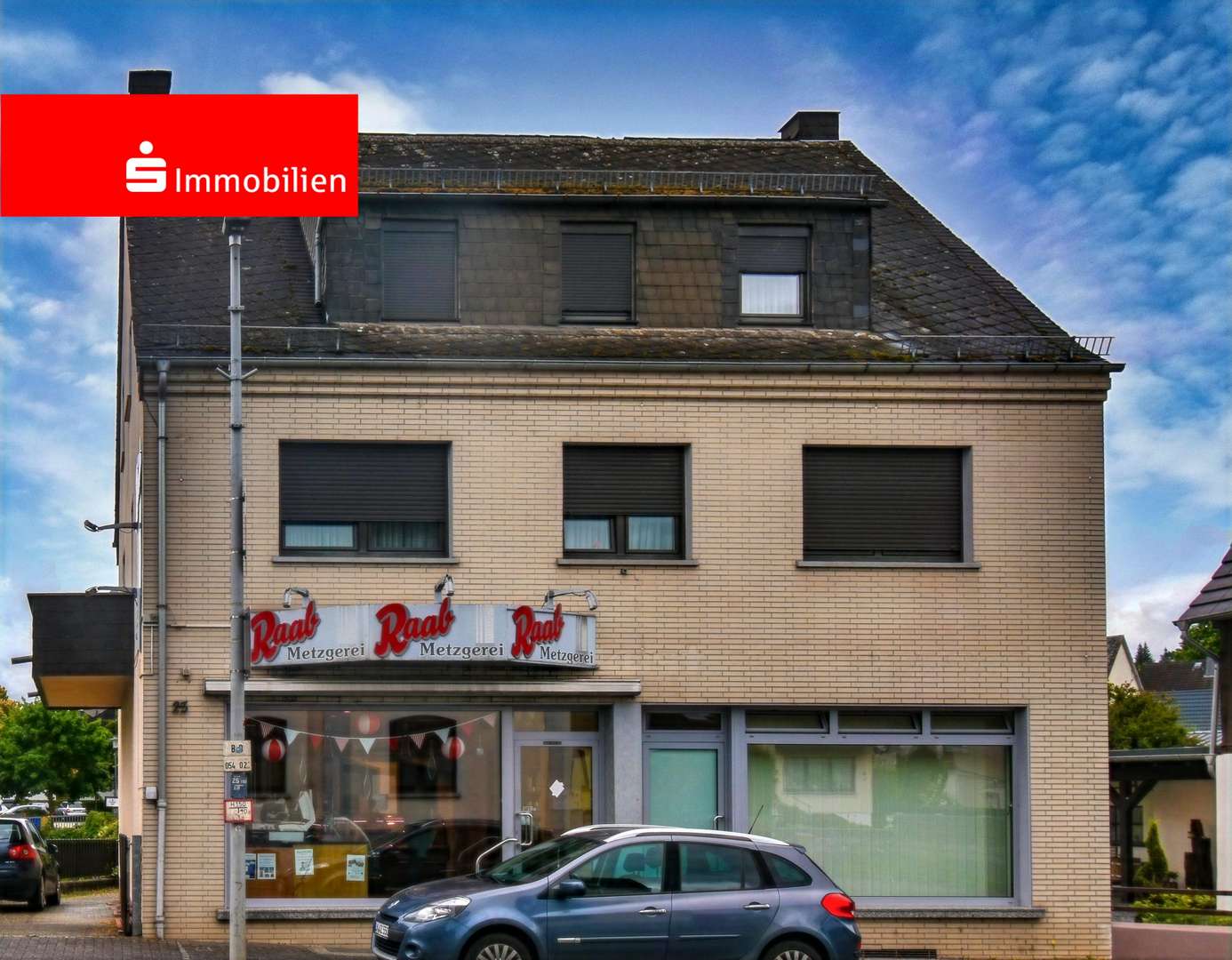 Straßenansicht - Mehrfamilienhaus in 65604 Elz mit 157m² kaufen