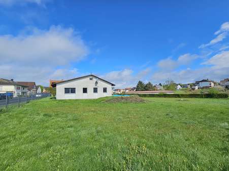 Außenansicht 3 - Einfamilienhaus in 35466 Rabenau mit 135m² kaufen