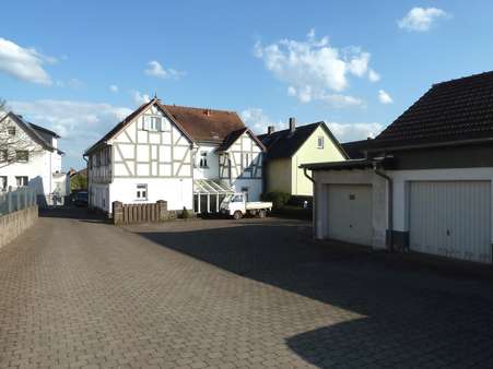 Rückansicht - Mehrfamilienhaus in 35418 Buseck mit 215m² kaufen