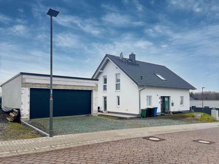 Außenansicht - Einfamilienhaus in 35463 Fernwald mit 145m² kaufen
