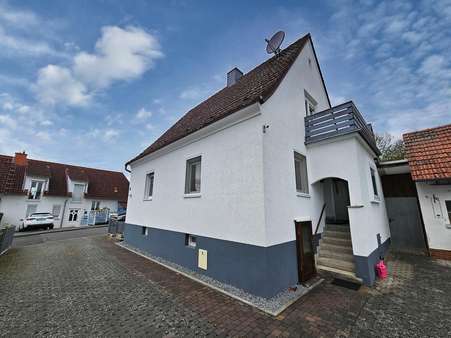 Außenansicht 2 - Einfamilienhaus in 35428 Langgöns mit 93m² kaufen