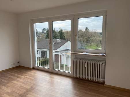 Wohnzimmer - Etagenwohnung in 35463 Fernwald mit 58m² kaufen