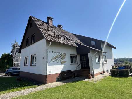 Seitenansicht - Einfamilienhaus in 35415 Pohlheim mit 193m² kaufen