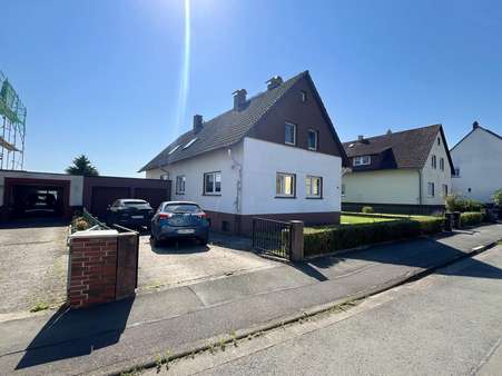 Straßenansicht - Einfamilienhaus in 35415 Pohlheim mit 193m² kaufen