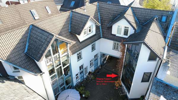 Luftaufnahme Innenhof - Dachgeschosswohnung in 35415 Pohlheim mit 82m² kaufen