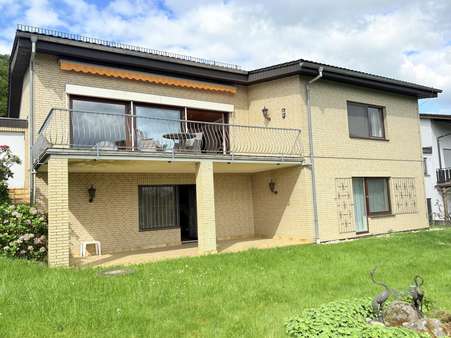 Gartenansicht - Einfamilienhaus in 35444 Biebertal mit 128m² kaufen