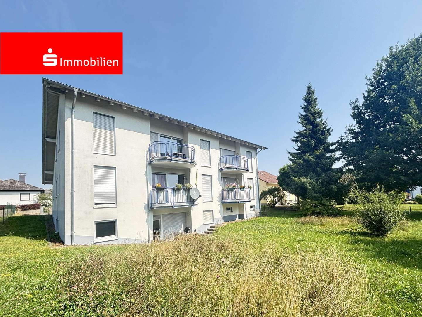 Hausansicht vom Garten Hausansicht vom Garten - Etagenwohnung in 35447 Reiskirchen mit 71m² kaufen