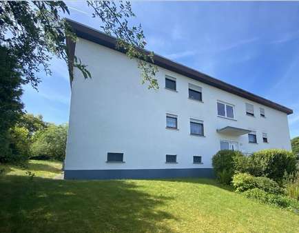 Außenansicht Außenansicht - Souterrain-Wohnung in 35606 Solms mit 87m² kaufen