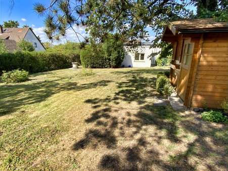 Blick Garten zum Haus Blick Garten zum Haus - Einfamilienhaus in 35463 Fernwald mit 117m² kaufen