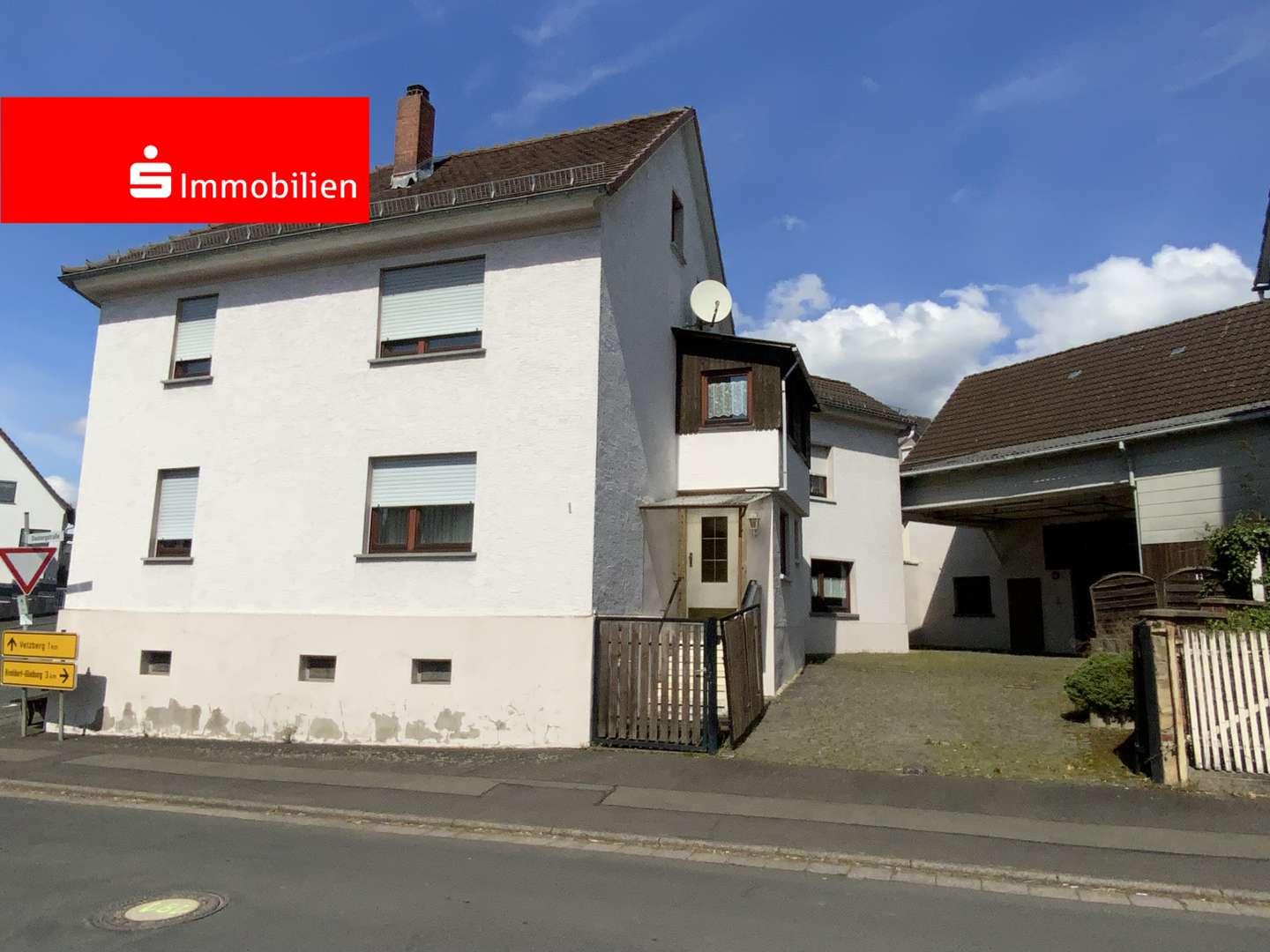 Straßenansicht I - Einfamilienhaus in 35444 Biebertal mit 120m² kaufen