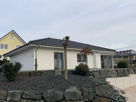 Pflegeleichtes Grundstück - Bungalow in 35619 Braunfels mit 95m² kaufen