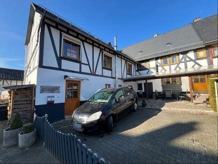 Straßenansicht - Einfamilienhaus in 35708 Haiger mit 170m² kaufen