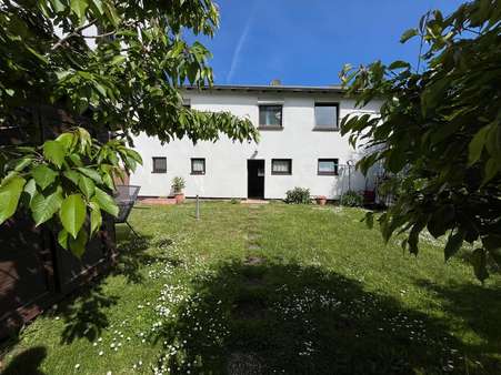 Ansicht vom Garten - Reihenendhaus in 35767 Breitscheid mit 74m² kaufen