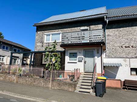 Ansicht Wohnhaus - Einfamilienhaus in 35745 Herborn mit 125m² kaufen
