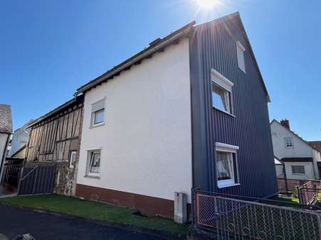Rückansicht - Einfamilienhaus in 35745 Herborn mit 125m² kaufen