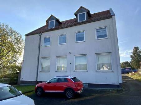 Rückansicht - Mehrfamilienhaus in 34270 Schauenburg mit 104m² kaufen