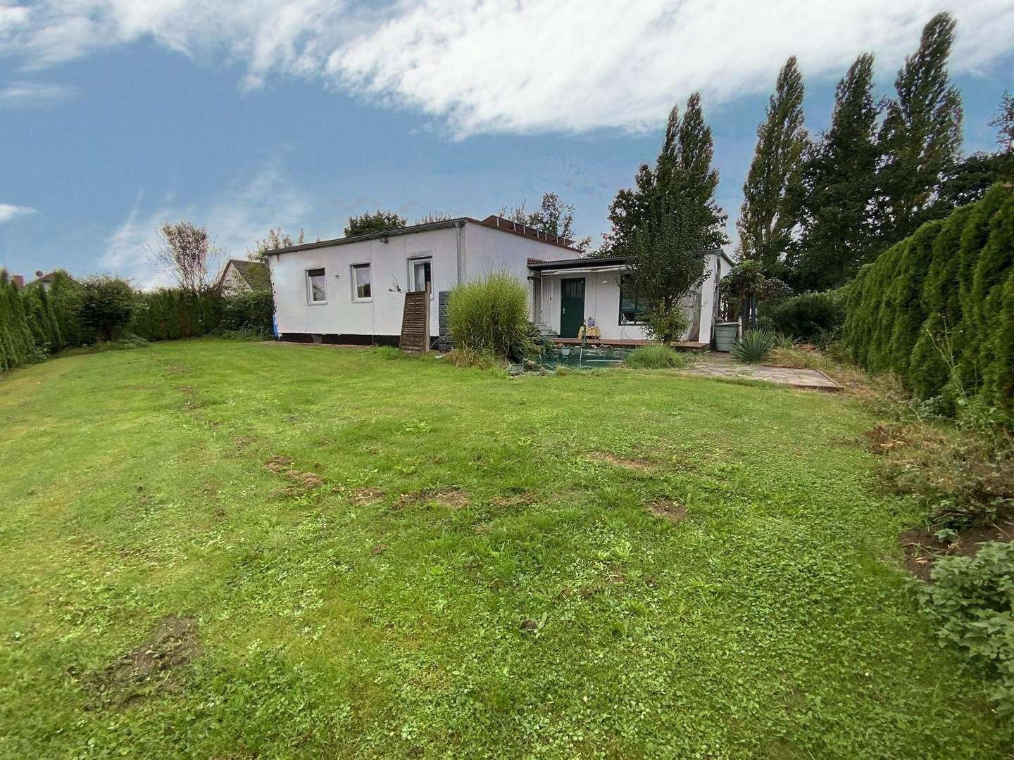 Gartenansicht - Bungalow in 34128 Kassel mit 78m² kaufen