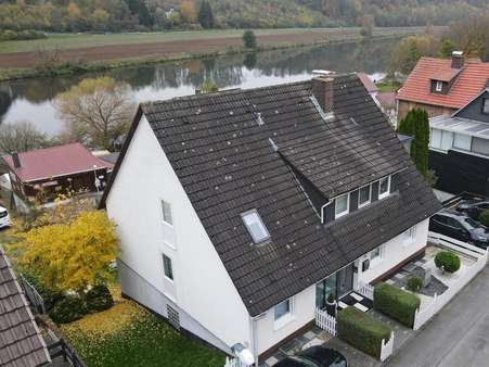 Hausansicht - Zweifamilienhaus in 34277 Fuldabrück mit 200m² kaufen