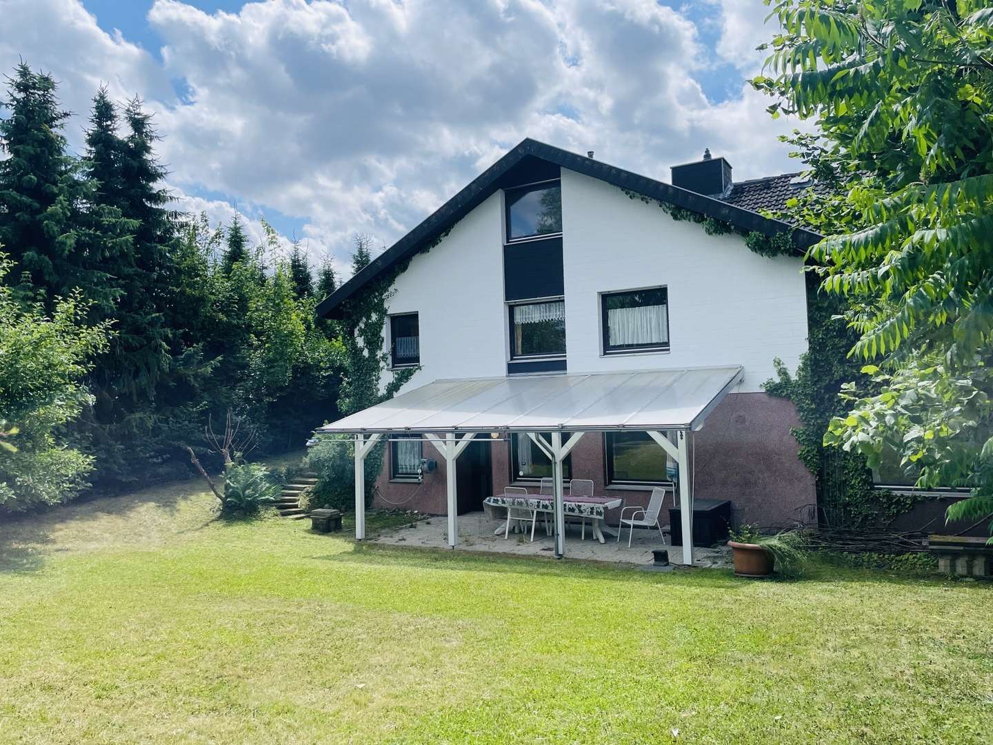 Rückansicht Rückansicht - Einfamilienhaus in 34369 Hofgeismar mit 195m² kaufen