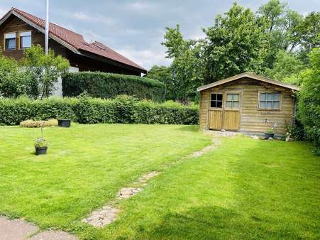 Blick in den Garten Blick in den Garten - Einfamilienhaus in 34379 Calden mit 202m² kaufen