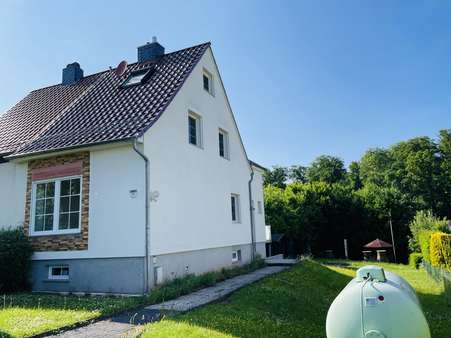 Seitenansicht Seitenansicht - Doppelhaushälfte in 34314 Espenau mit 95m² kaufen