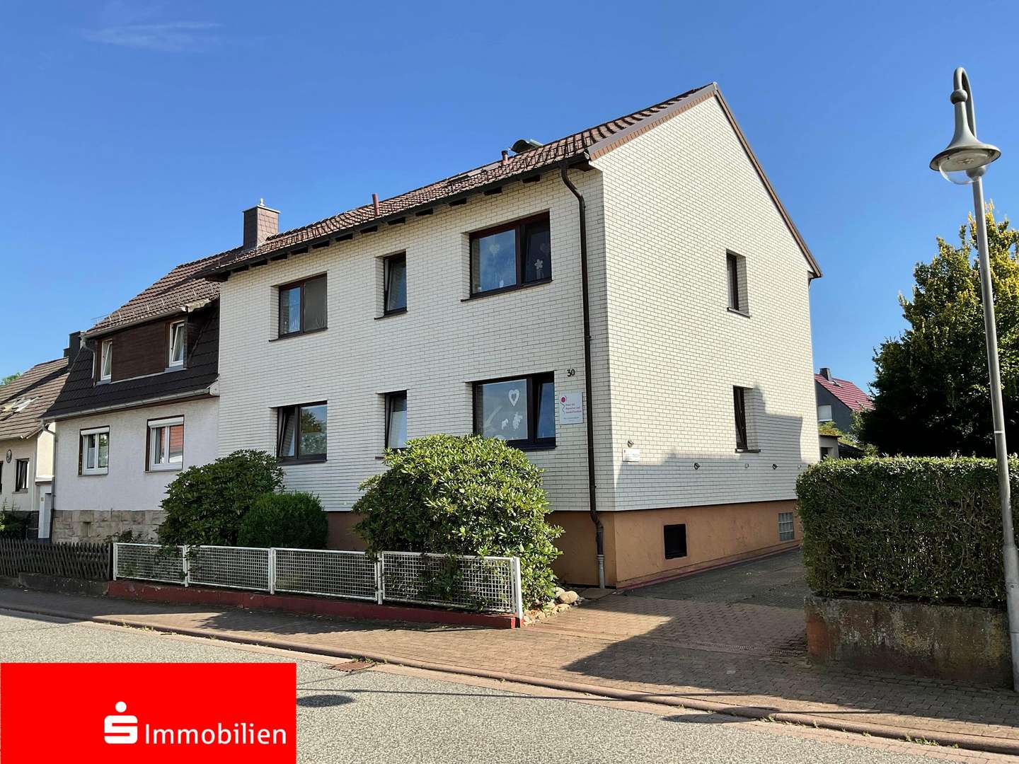 Außenansicht Außenansicht - Doppelhaushälfte in 37235 Hessisch Lichtenau mit 152m² kaufen
