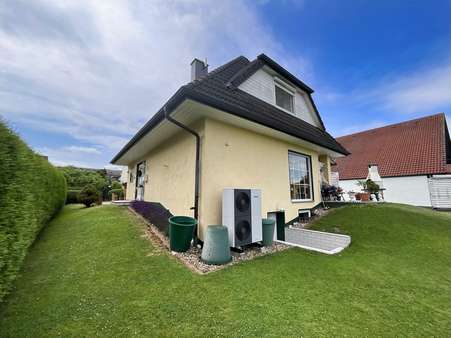 Seiten-/Rückansicht Seiten-/Rückansicht - Einfamilienhaus in 37269 Eschwege mit 121m² kaufen