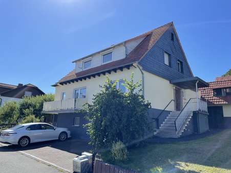 Ansicht von der Straße - Einfamilienhaus in 35099 Burgwald mit 126m² kaufen