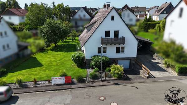 front - Einfamilienhaus in 35114 Haina mit 131m² kaufen