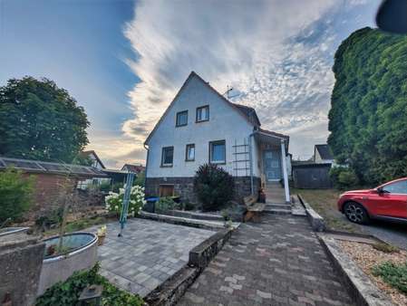 Ansicht von der Straße Ansicht von der Straße - Einfamilienhaus in 34516 Vöhl mit 150m² kaufen