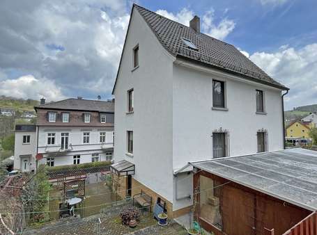 Mischgarten und Freisitzbereich - Zweifamilienhaus in 36364 Bad Salzschlirf mit 146m² kaufen