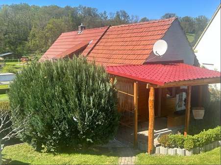 Ansicht aus dem Garten - Einfamilienhaus in 36179 Bebra mit 92m² kaufen