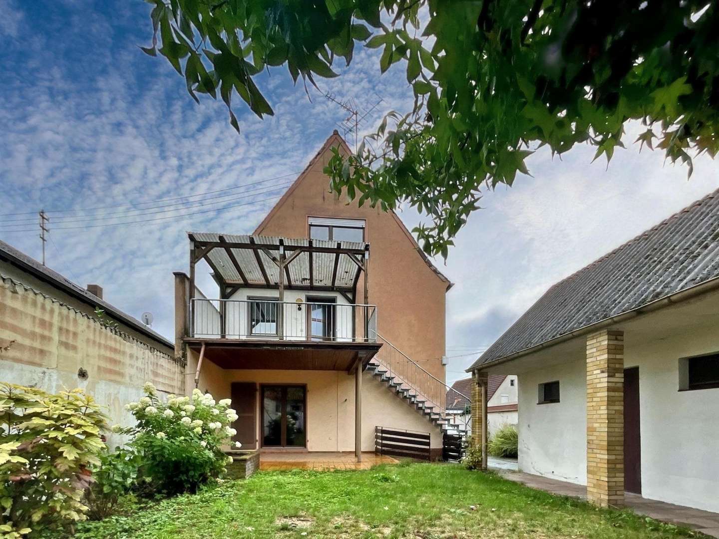 Gartenansicht Gartenansicht - Zweifamilienhaus in 67360 Lingenfeld mit 217m² kaufen