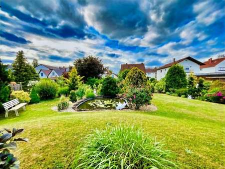 Ihr Rückzugsort zum Entschleunigen Ihr Rückzugsort zum Entschleunigen - Zweifamilienhaus in 67459 Böhl-Iggelheim mit 125m² kaufen