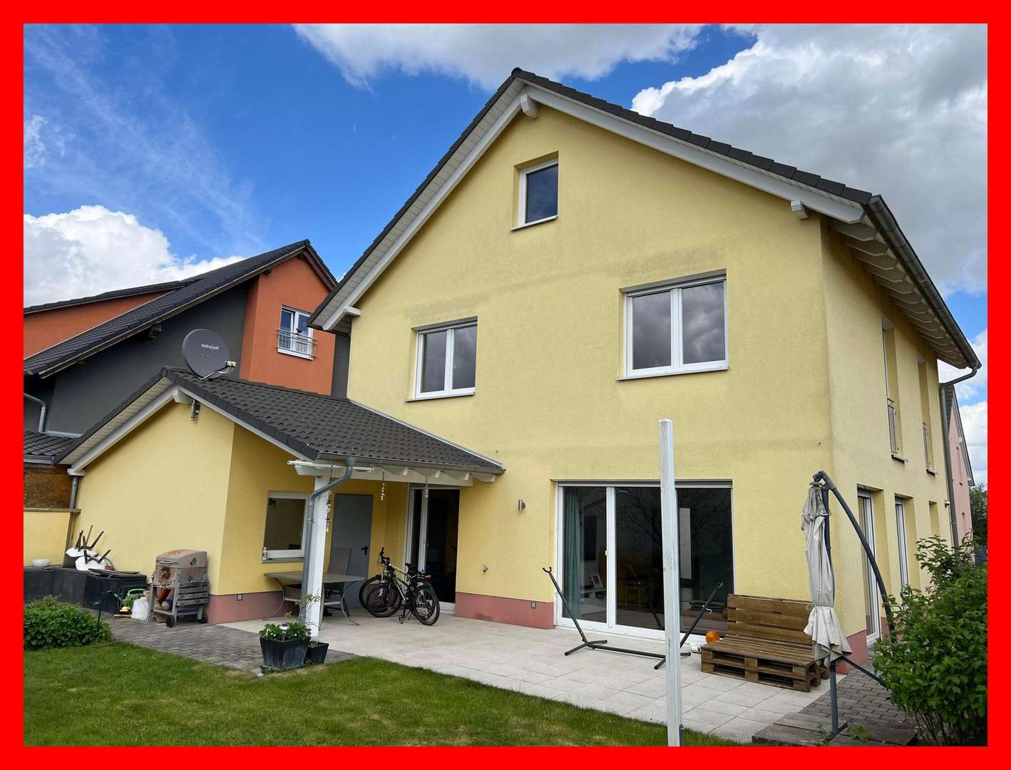 Hausrückseite mit Terrasse - Einfamilienhaus in 76879 Bornheim mit 130m² kaufen