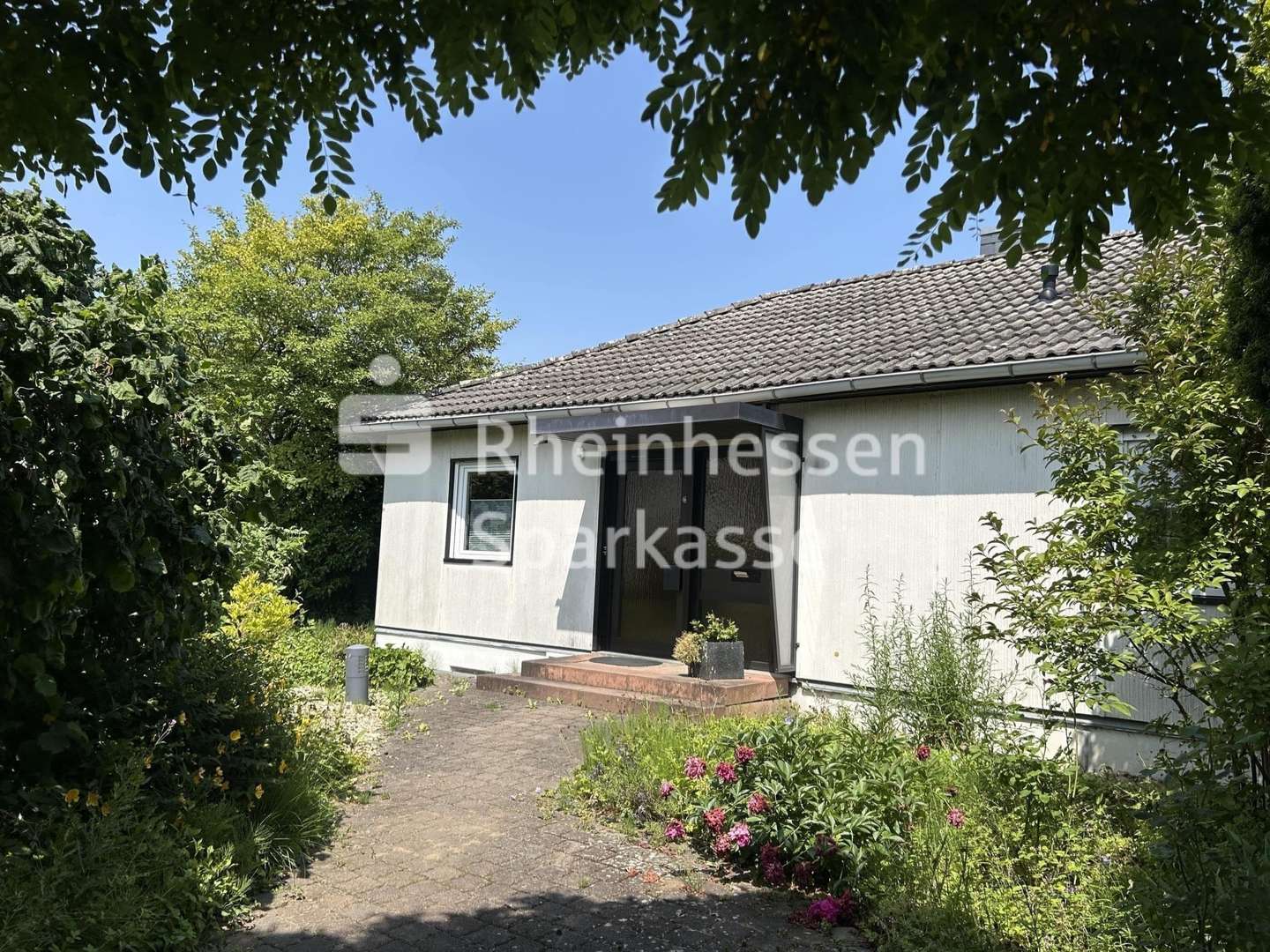 Straßenansicht - Bungalow in 55294 Bodenheim mit 117m² kaufen